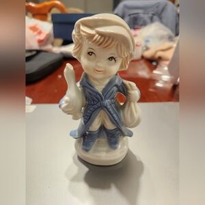 KPM Porcelain Child Figurine Holding Duck And Bag  2H”x3L”